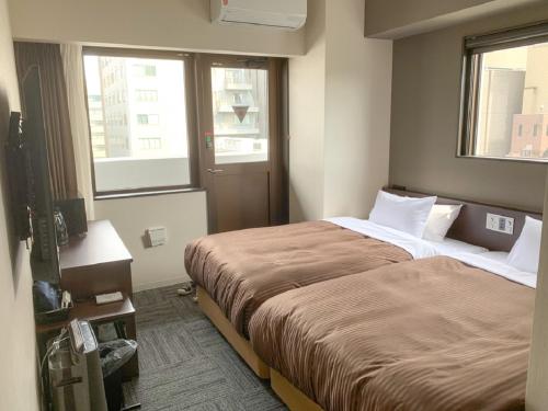 Легло или легла в стая в HOTEL LiVEMAX Hiroshima Peace Park Mae