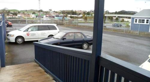 a car parked on a balcony with a view of a street at Essex Arms in Huntly