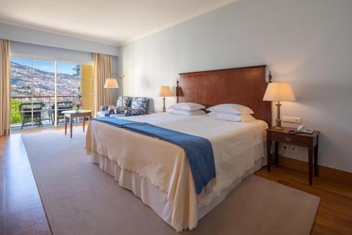 Кровать или кровати в номере Quinta Jardins do Lago