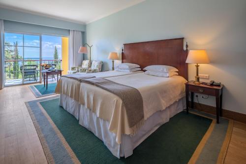 Кровать или кровати в номере Quinta Jardins do Lago