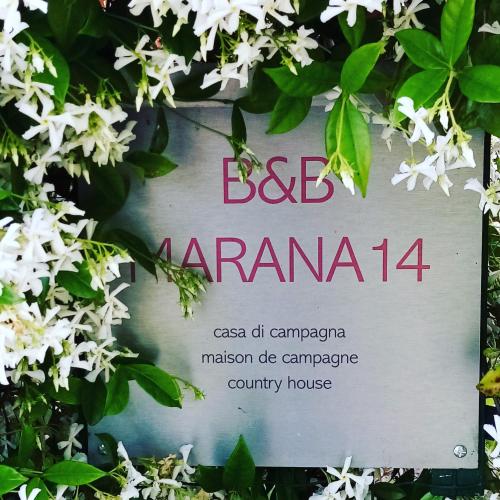 a sign for a beearmaarmaarmaason diecommerce county house at B&B Marana 14 Casa di Campagna in Bologna