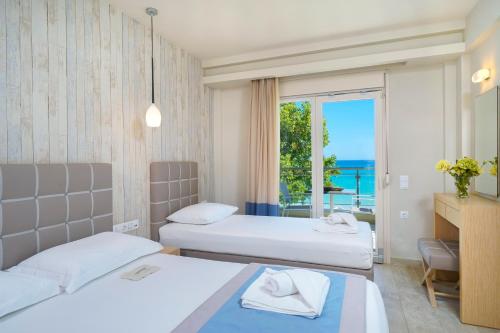 Säng eller sängar i ett rum på Iliorama Luxury Apartments