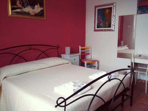 Postel nebo postele na pokoji v ubytování B&B Le Muse