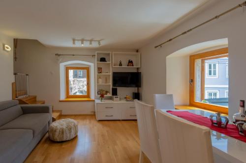 a living room with a couch and a table at Krka Waterfalls in Skradin