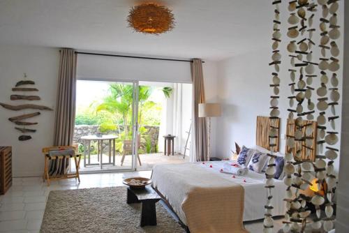 Bliss Boutique Hotel Seychellesにあるベッド