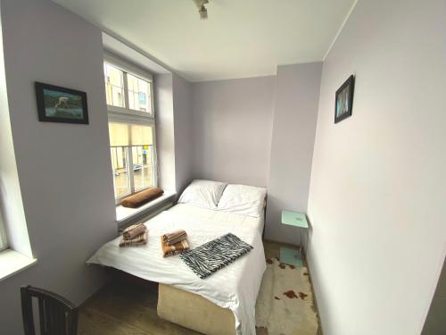 Posteľ alebo postele v izbe v ubytovaní Gdańskie Apartamenty - Apartament Targ Rybny z widokiem na Motławę