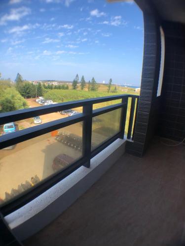 a view of a balcony with a view of the ocean at Jieyuan Homestay in Huxi