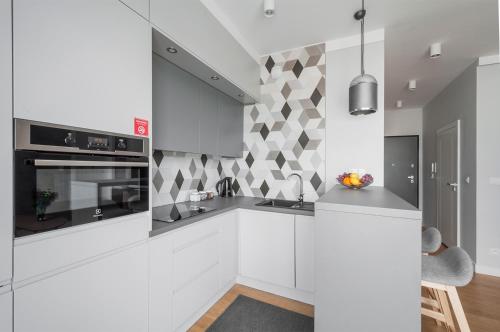 Kuchyň nebo kuchyňský kout v ubytování Dream4You Apartments