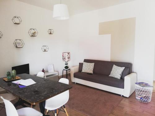 Ein Sitzbereich in der Unterkunft My Home Appartamento