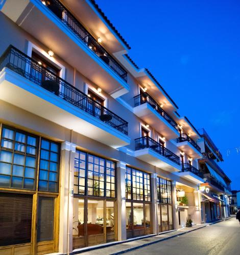 an exterior view of a building at night at Fedriades Delphi Hotel in Delfoi