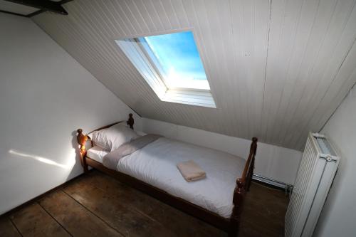 Ліжко або ліжка в номері Hof Zuidvliet