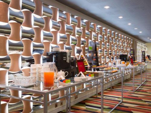 a store filled with lots of plates and cups at Adagio Abu Dhabi Al Bustan in Abu Dhabi
