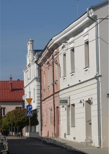a building on the side of a street at Apartamenty Dukla in Dukla