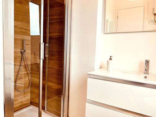 a bathroom with a shower and a sink at La Casa di Mia in Marina di Campo