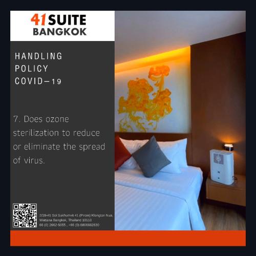a poster of a bed in a hotel room at 41 Suite Bangkok in Bangkok