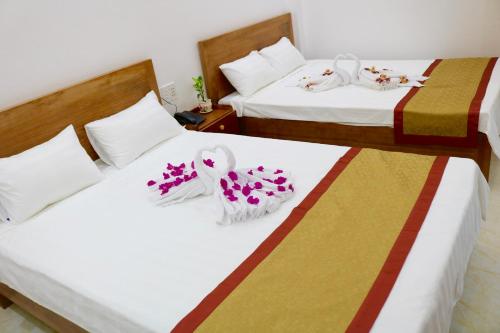 Posteľ alebo postele v izbe v ubytovaní Hoa Anh Đào Motel