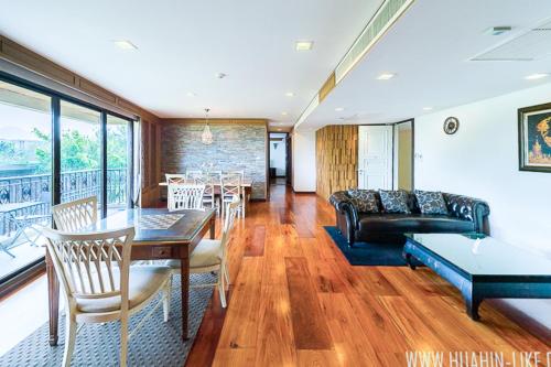 a living room with a couch and a table at Marrakesh Huahin 4bedrooms suite with Jacuzzi 208 in Hua Hin