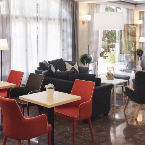 Coin salon dans l'établissement Bacoli Hotel