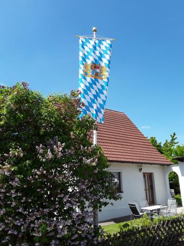 a flag on the top of a house at Ferienhaus Tangrintel in Hemau
