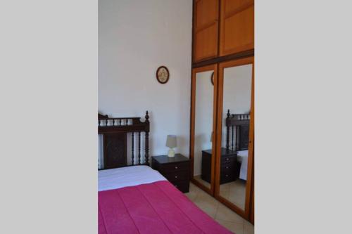 Ένα ή περισσότερα κρεβάτια σε δωμάτιο στο Aegina House