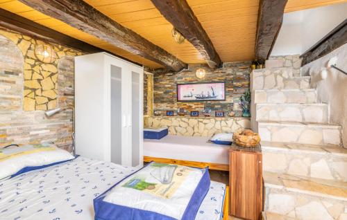 Posteľ alebo postele v izbe v ubytovaní Stone House Knez
