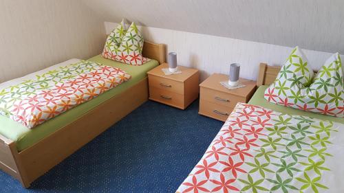 Tempat tidur dalam kamar di Hausnordlicht FEWO 4
