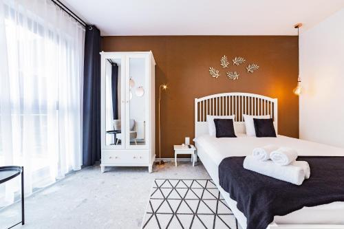 Posteľ alebo postele v izbe v ubytovaní Odra View Apartments III