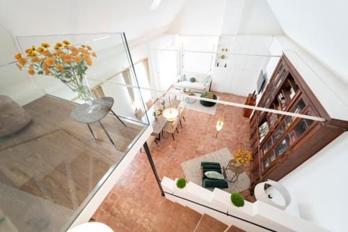 an overhead view of a living room with a vase of flowers at Haus im Schlossergässchen in Baden