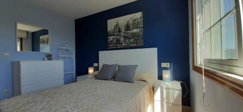 Katil atau katil-katil dalam bilik di Montalvo Apartamento