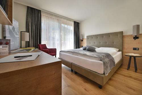 Postel nebo postele na pokoji v ubytování Roberta Loft - rooms and apartments
