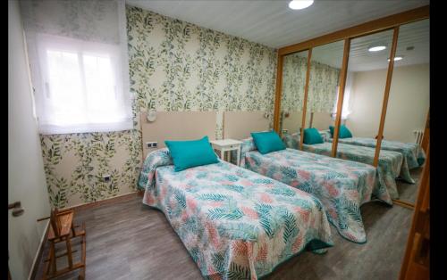 Posteľ alebo postele v izbe v ubytovaní La casita de lola