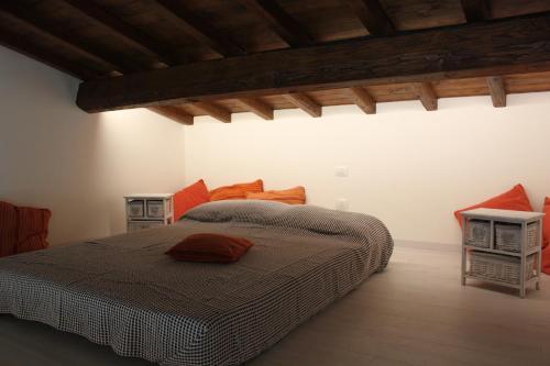 Posteľ alebo postele v izbe v ubytovaní La Casa del Fico villa con piscina