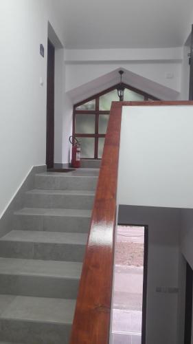 a stairway in a building with a stair case at Blue Danube Apartment in Belgrade