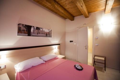 Tempat tidur dalam kamar di Alloggio Le Macine