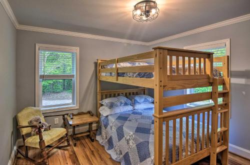 a bedroom with a bunk bed and a chair at Rustic Sunset Escape on 67 Acres Outdoor Kitchen in Sunset