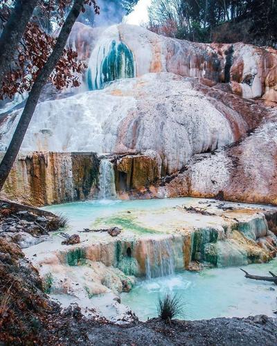 a painting of a waterfall and a pool of water at Locanda Vesuna Hotel Countryhouse in Pienza
