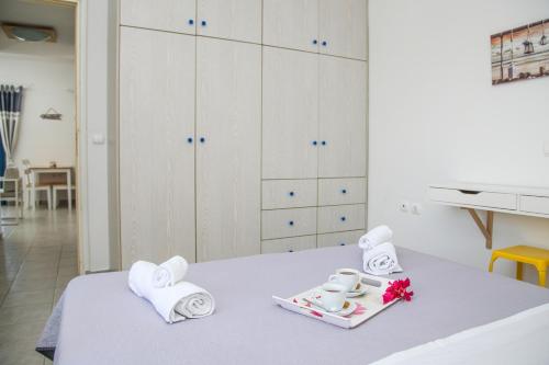 Ένα ή περισσότερα κρεβάτια σε δωμάτιο στο MMM Apartment