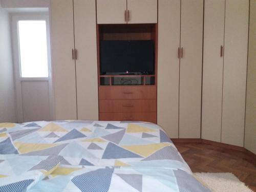 Ein Bett oder Betten in einem Zimmer der Unterkunft Stan na dan DUNJA 1