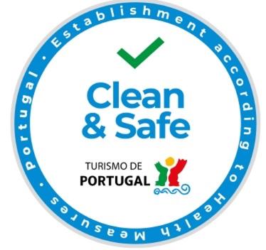 a blue clean and safe logo on a white background at Quinta Da Ventuzela in Cinfães