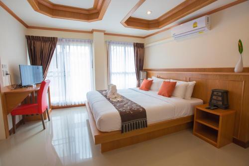 Postel nebo postele na pokoji v ubytování Phurua Inn ภูเรือ อินน์