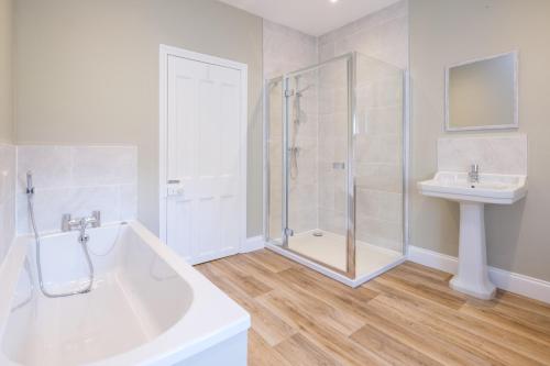 Et badeværelse på The Dower Cottage