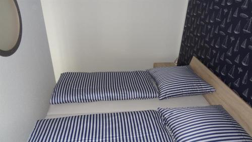 Postel nebo postele na pokoji v ubytování Ferienwohnung Olympiadeck