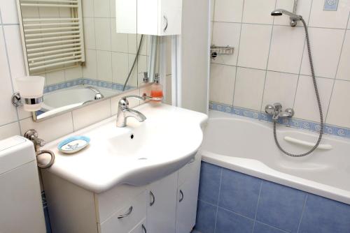 Ванна кімната в Apartments AS - Zagreb Centre