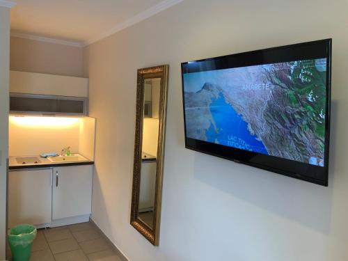 Televisyen dan/atau pusat hiburan di Hotel zum Hafen