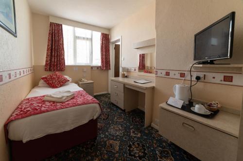 Katil atau katil-katil dalam bilik di Bournemouth Sands Hotel