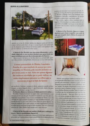 a article in a magazine about a bed in a garden at Quinta Sao Martinho in Reguengo Grande