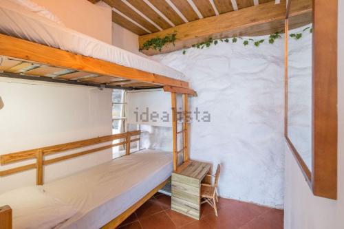 Bunk bed o mga bunk bed sa kuwarto sa Barca Serena