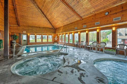 a large indoor swimming pool in a building at Studio about 3 Mi to Great Smoky Mountain Natl Park! in Gatlinburg