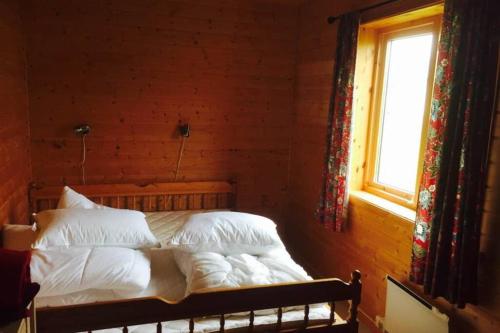 A bed or beds in a room at Grandfathers house at the end of Europe, Varanger