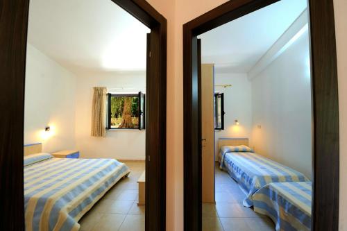 Katil atau katil-katil dalam bilik di Zagare Residence